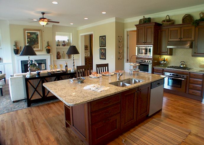 Gourmet Kitchens With Hardwood Floors, Granite Counters, Stainless Steel Appliances And Italian Cabinets